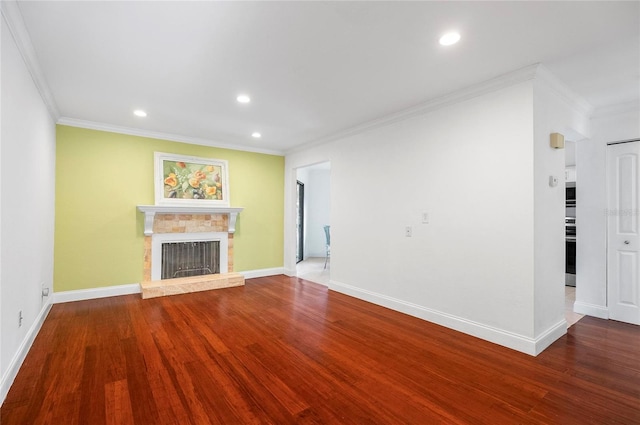 8 Oakmont Ct Unit 0, Palm Coast, FL 32137 - unfurnished living room featuring crown molding, recessed lighting, a stone fireplace, wood finished floors, and baseboards