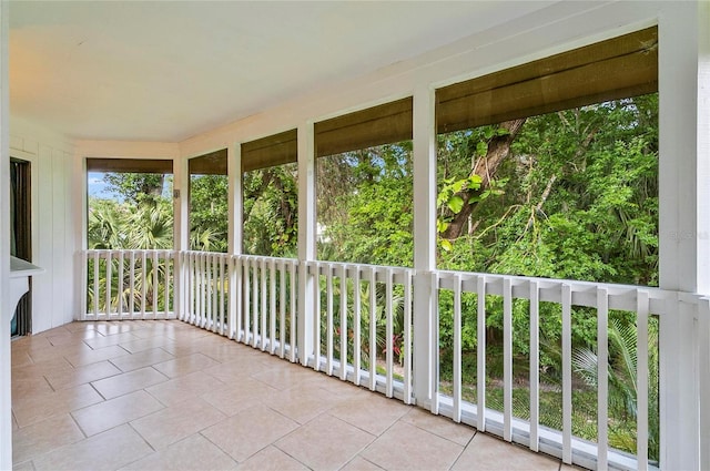 8 Oakmont Ct Unit 0, Palm Coast, FL 32137 - unfurnished sunroom with tile patterned flooring