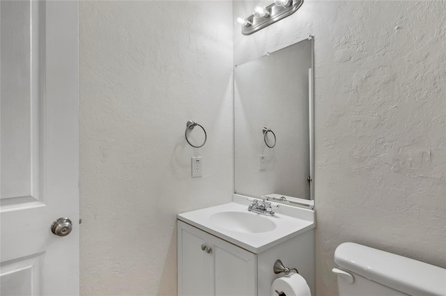 8 Oakmont Ct Unit 0, Palm Coast, FL 32137 - bathroom with vanity and toilet