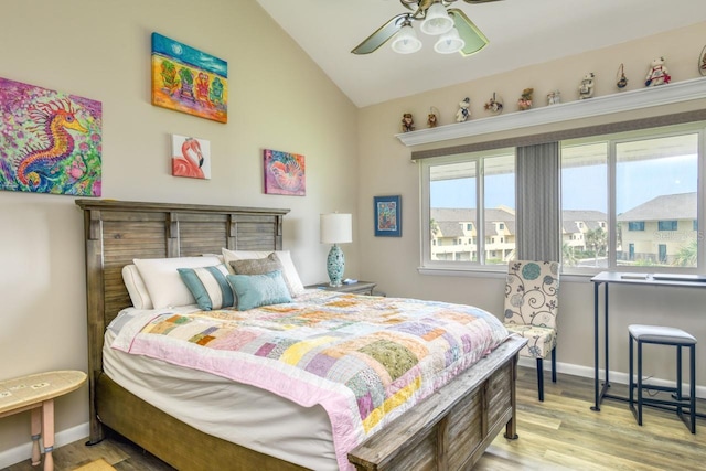 8550 A1A S Unit 323, Saint Augustine, FL 32080 - bedroom featuring vaulted ceiling, light wood finished floors, baseboards, and ceiling fan
