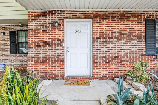 503 Kettering Way, Orange Park, FL 32073 - view of exterior entry featuring brick siding