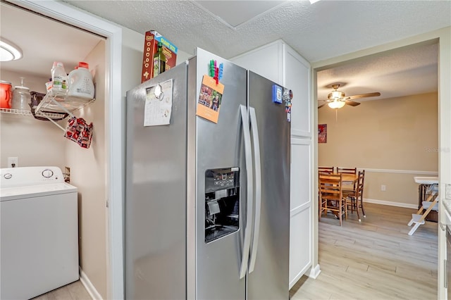 503 Kettering Way, Orange Park, FL 32073 - kitchen with washer / clothes dryer, stainless steel refrigerator with ice dispenser, a textured ceiling, a ceiling fan, and light wood finished floors