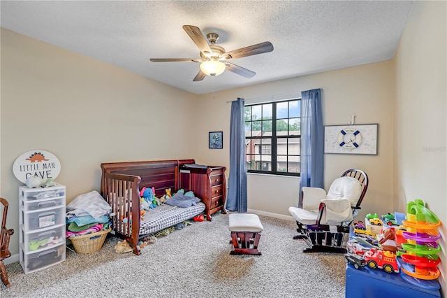 503 Kettering Way, Orange Park, FL 32073 - carpeted bedroom with a textured ceiling, ceiling fan, and baseboards