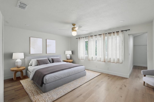 3 Cole Pl, Palm Coast, FL 32137 - bedroom with baseboards, light wood-style floors, and ceiling fan