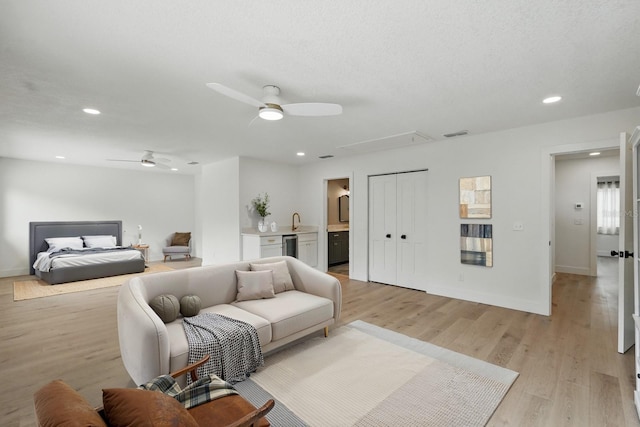 3 Cole Pl, Palm Coast, FL 32137 - living area featuring attic access, a ceiling fan, light wood finished floors, recessed lighting, and baseboards