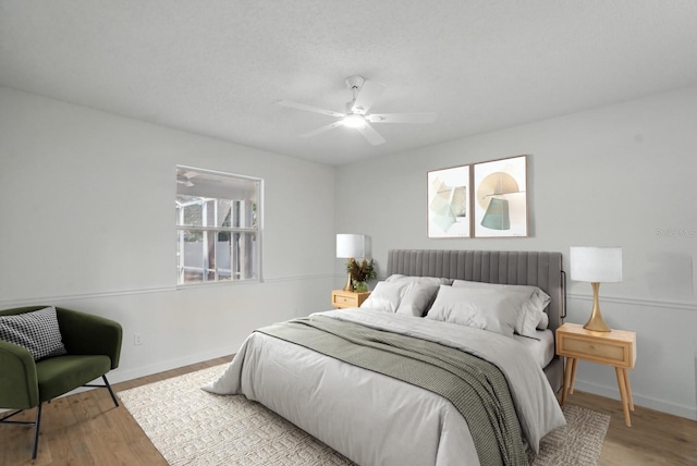 40 Pinetree Dr, Palm Coast, FL 32164 - bedroom featuring wood finished floors, baseboards, and ceiling fan