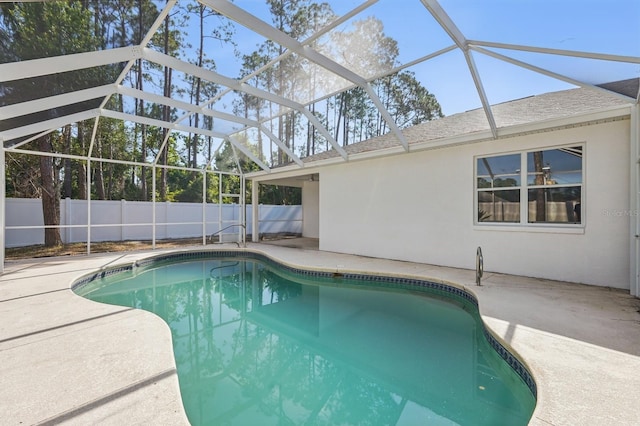 40 Pinetree Dr, Palm Coast, FL 32164 - view of swimming pool featuring a patio area and a lanai