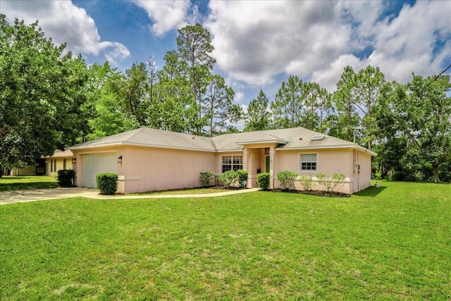 19 Utica Path, Palm Coast, FL 32164 - ranch-style house with an attached garage, concrete driveway, a front lawn, and stucco siding