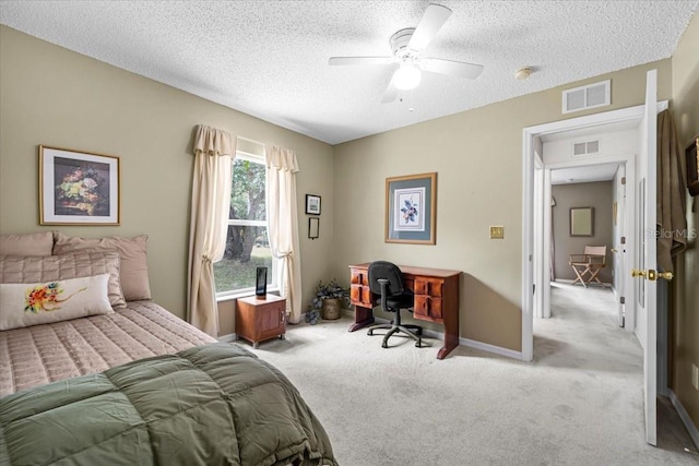 19 Utica Path, Palm Coast, FL 32164 - bedroom with carpet floors, a textured ceiling, an office area, ceiling fan, and baseboards