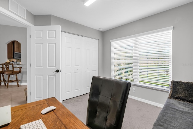 4 Contee Ct, Palm Coast, FL 32137 - office area featuring arched walkways and baseboards