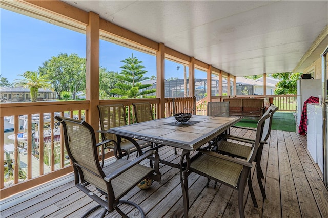 4 Contee Ct, Palm Coast, FL 32137 - sunroom featuring outdoor dining space