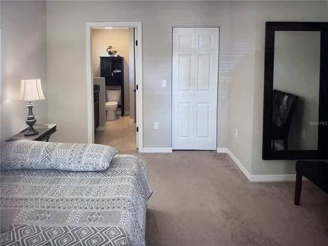4 Contee Ct, Palm Coast, FL 32137 - carpeted bedroom featuring baseboards, connected bathroom, and a closet
