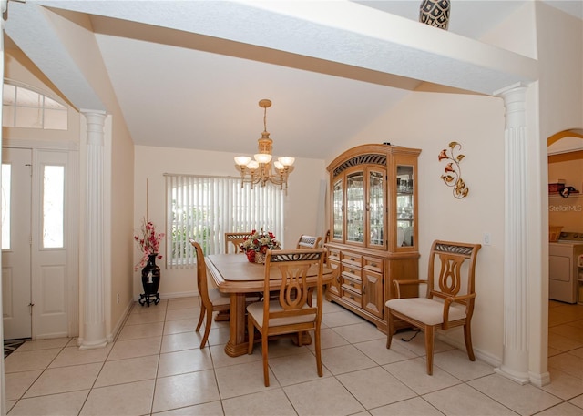1 Butternut Dr, Palm Coast, FL 32137 - dining area featuring washer / clothes dryer, ornate columns, light tile patterned floors, vaulted ceiling, and a chandelier