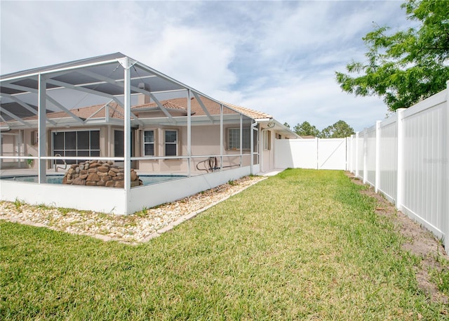 1 Butternut Dr, Palm Coast, FL 32137 - rear view of house featuring a lanai