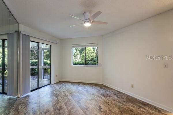 9 Masters Ct, Palm Coast, FL 32137 - unfurnished room featuring ceiling fan and baseboards