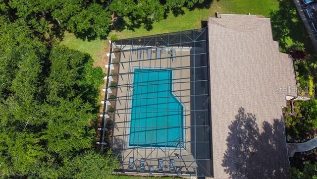 9 Masters Ct, Palm Coast, FL 32137 - drone / aerial view of a pool area