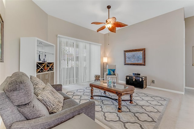 21 Webster Ln, Palm Coast, FL 32164 - carpeted living room with a ceiling fan and baseboards