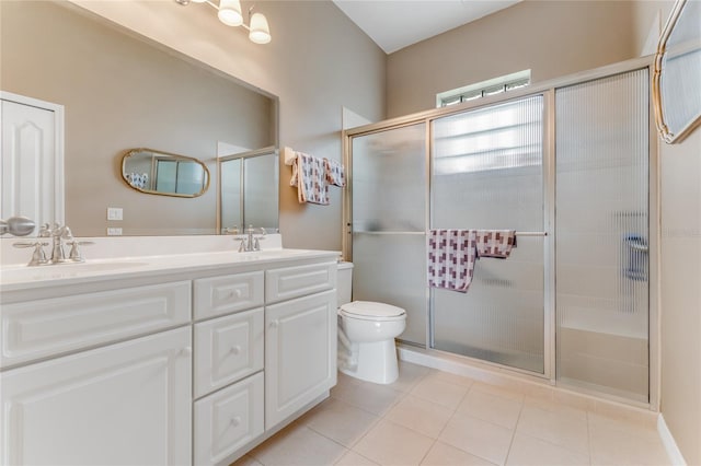 21 Webster Ln, Palm Coast, FL 32164 - full bathroom with toilet, double vanity, a stall shower, and tile patterned flooring