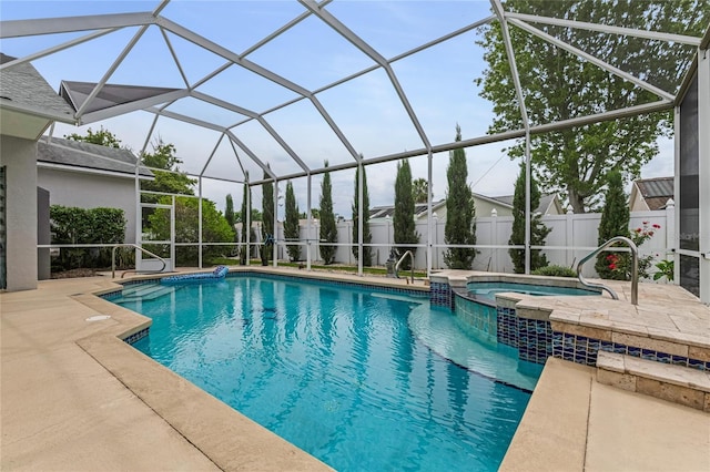 21 Webster Ln, Palm Coast, FL 32164 - view of swimming pool with a patio, a fenced backyard, and a pool with connected hot tub