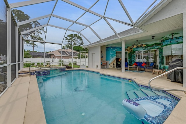 21 Webster Ln, Palm Coast, FL 32164 - view of swimming pool featuring a patio area, outdoor lounge area, a pool with connected hot tub, grilling area, and a lanai