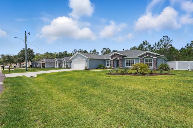 70 Esperanto Dr, Palm Coast, FL 32164 - ranch-style house featuring concrete driveway and an attached garage