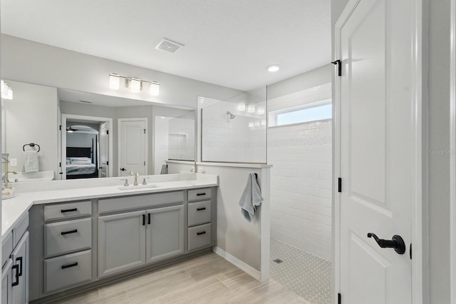70 Esperanto Dr, Palm Coast, FL 32164 - full bath featuring ensuite bath, vanity, walk in shower, and a ceiling fan