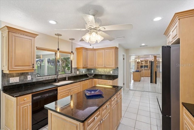16 S Claymont Ct S, Palm Coast, FL 32137 - kitchen featuring black dishwasher, freestanding refrigerator, ceiling fan, tasteful backsplash, and light tile patterned floors