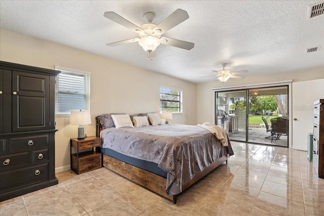 16 S Claymont Ct S, Palm Coast, FL 32137 - bedroom featuring access to exterior, ceiling fan, and a textured ceiling