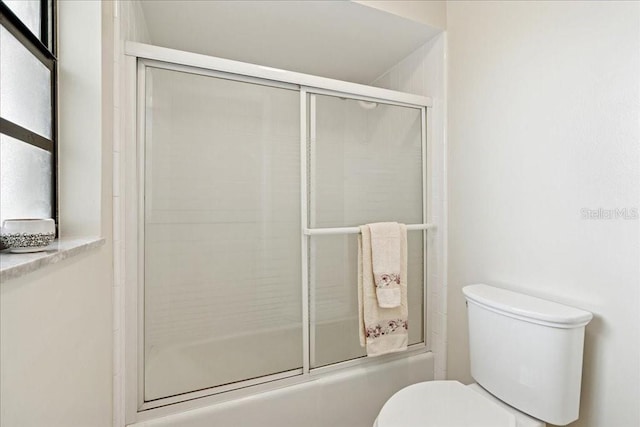 16 S Claymont Ct S, Palm Coast, FL 32137 - full bathroom featuring toilet and enclosed tub / shower combo