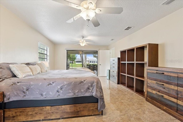 16 S Claymont Ct S, Palm Coast, FL 32137 - bedroom with access to exterior, a textured ceiling, and a ceiling fan