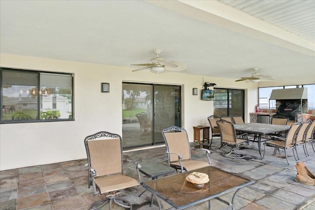 16 S Claymont Ct S, Palm Coast, FL 32137 - view of patio / terrace featuring outdoor dining area and a ceiling fan