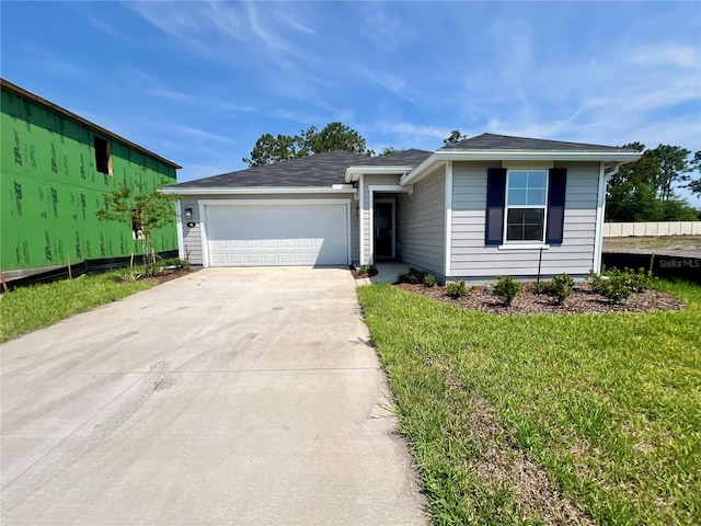 96 Waverly Ln, Palm Coast, FL 32164 - single story home with a garage and driveway