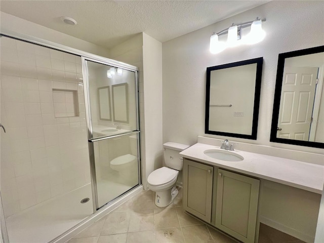 96 Waverly Ln, Palm Coast, FL 32164 - full bath with toilet, a shower stall, vanity, a textured ceiling, and tile patterned floors