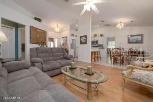 54 Price Ln, Palm Coast, FL 32164 - living room with ceiling fan and wood finished floors