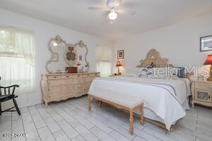 54 Price Ln, Palm Coast, FL 32164 - bedroom featuring ceiling fan