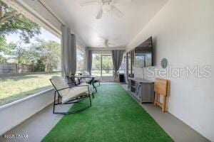54 Price Ln, Palm Coast, FL 32164 - sunroom / solarium featuring a ceiling fan