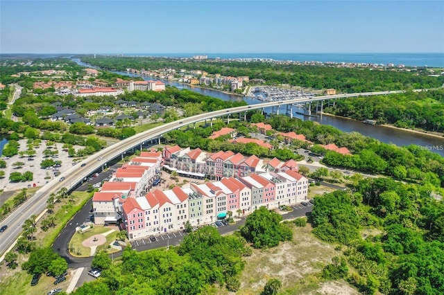 101 Palm Harbor Pkwy Unit A403, Palm Coast, FL 32137 - bird's eye view of a notable bridge, a large body of water, apartment complex, and a tree filled landscape