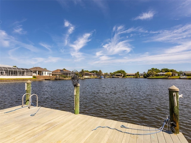9 Cotton Ct, Palm Coast, FL 32137 - dock featuring a water view and a residential view