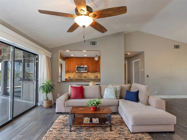 9 Cotton Ct, Palm Coast, FL 32137 - living room featuring dark wood finished floors, lofted ceiling, ceiling fan, and baseboards