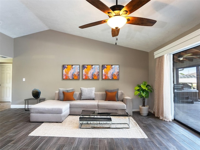9 Cotton Ct, Palm Coast, FL 32137 - living room featuring lofted ceiling, a ceiling fan, baseboards, and dark wood-type flooring