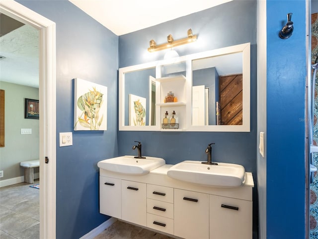 9 Cotton Ct, Palm Coast, FL 32137 - full bath featuring baseboards and double vanity