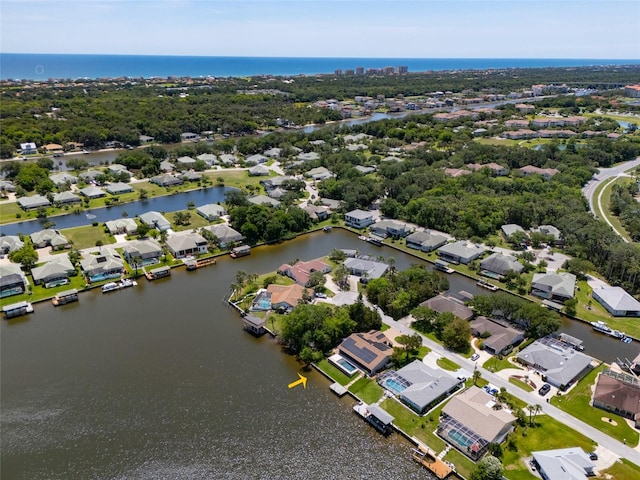 9 Cotton Ct, Palm Coast, FL 32137 - aerial view of property and surrounding area featuring a nearby body of water and nearby suburban area