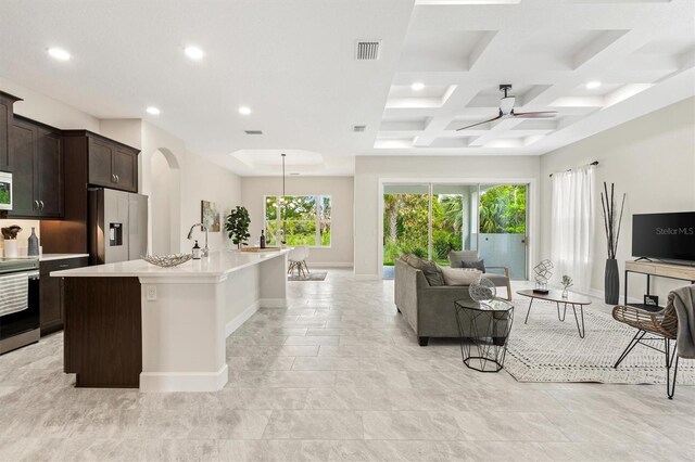 80 N Lakewalk Dr, Palm Coast, FL 32137 - kitchen featuring stainless steel appliances, open floor plan, a ceiling fan, recessed lighting, and light countertops