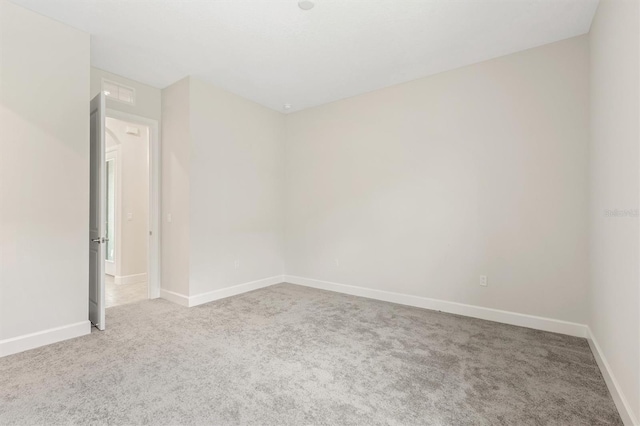 80 N Lakewalk Dr, Palm Coast, FL 32137 - unfurnished room with carpet and baseboards