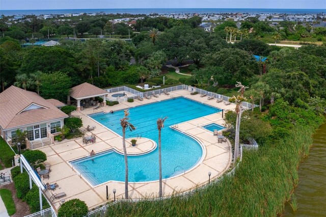 80 N Lakewalk Dr, Palm Coast, FL 32137 - community pool featuring a patio area and a gazebo