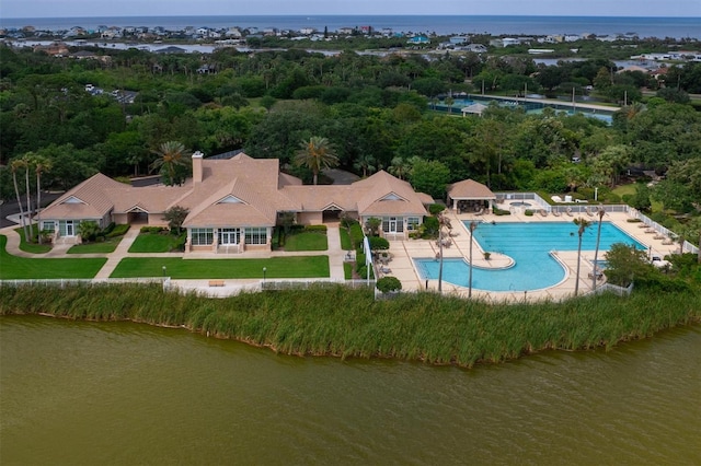 80 N Lakewalk Dr, Palm Coast, FL 32137 - aerial view of property and surrounding area with a large body of water and a pool area