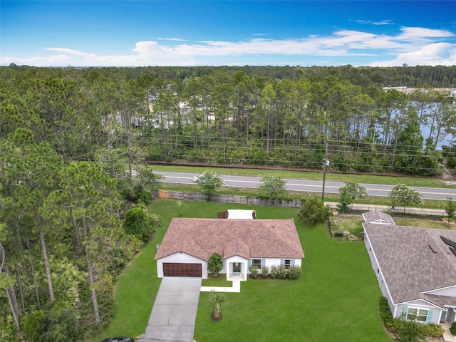 14 Zollinger Pl, Palm Coast, FL 32164 - view from above of property with a heavily wooded area