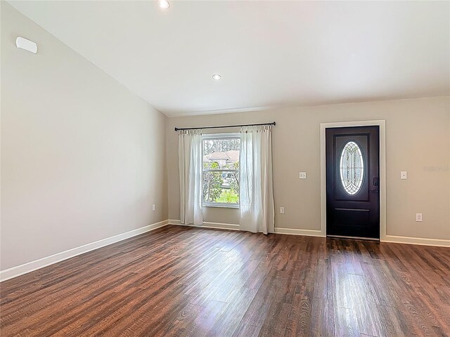 14 Zollinger Pl, Palm Coast, FL 32164 - foyer with dark wood finished floors, baseboards, and recessed lighting