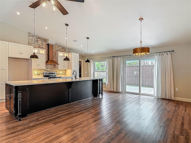 14 Zollinger Pl, Palm Coast, FL 32164 - kitchen with wall chimney range hood, electric stove, light countertops, decorative backsplash, and ceiling fan