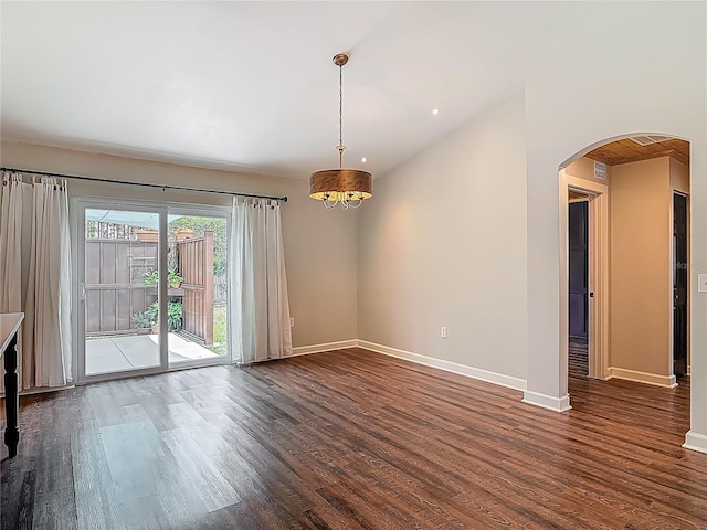 14 Zollinger Pl, Palm Coast, FL 32164 - unfurnished room featuring dark wood-style flooring, arched walkways, and baseboards